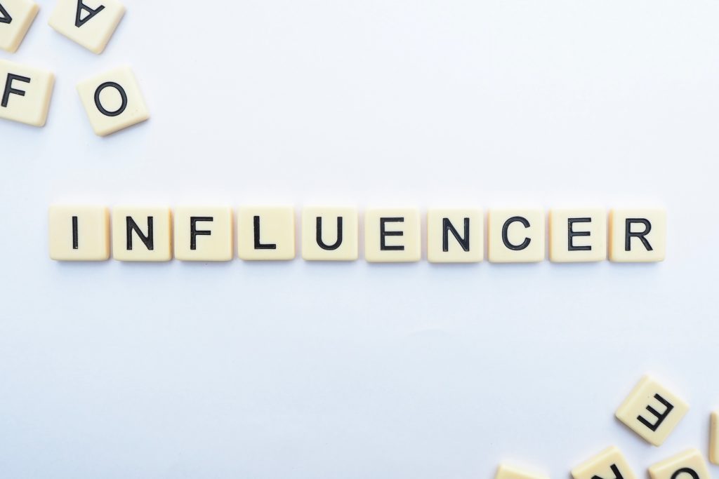 Influencer spelt in letter blocks